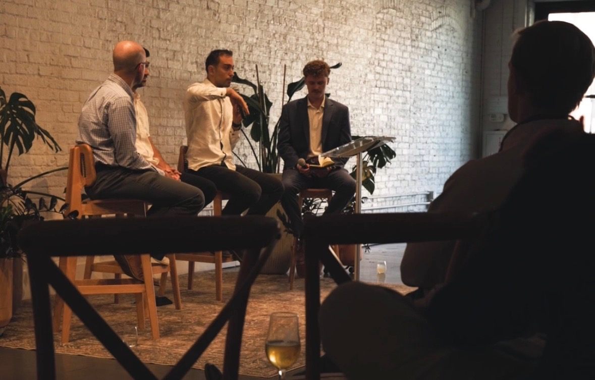 A panel discussion in warm evening light at a RAL Meetup gathering